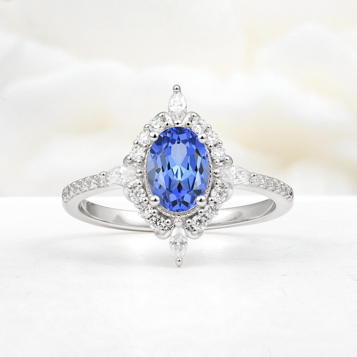 Oval Cut Sapphire Starburst Halo Engagement Ring with Pavé Band - Additional view