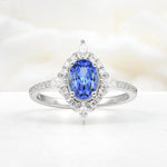 Oval Cut Sapphire Starburst Halo Engagement Ring with Pavé Band - Additional view