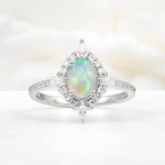 Oval Cut Fire Opal Starburst Halo Engagement Ring with Pavé Band - Additional view