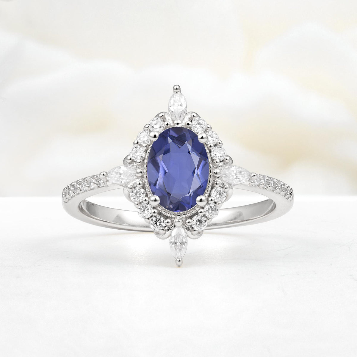 Oval Cut Tanzanite Starburst Halo Engagement Ring with Pavé Band - Additional view