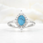Oval Cut Turquoise Starburst Halo Engagement Ring with Pavé Band - Additional view