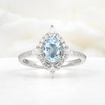 Oval Cut Aquamarine Starburst Halo Engagement Ring with Pavé Band - Additional view