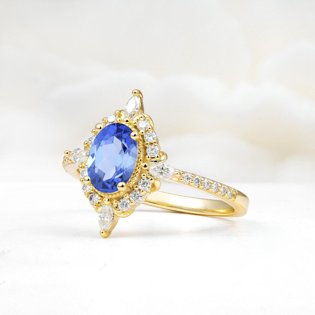 Oval Cut Sapphire Starburst Halo Engagement Ring with Pavé Band - Additional view