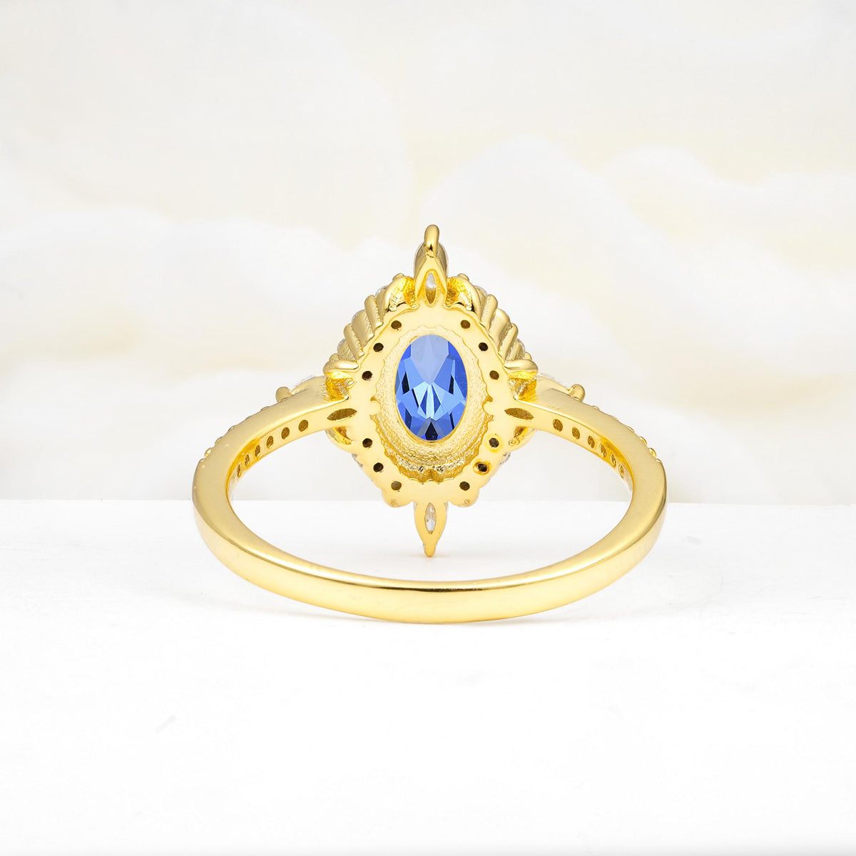 Oval Cut Sapphire Starburst Halo Engagement Ring with Pavé Band - Additional view