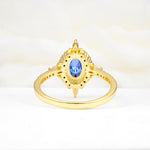 Oval Cut Sapphire Starburst Halo Engagement Ring with Pavé Band - Additional view