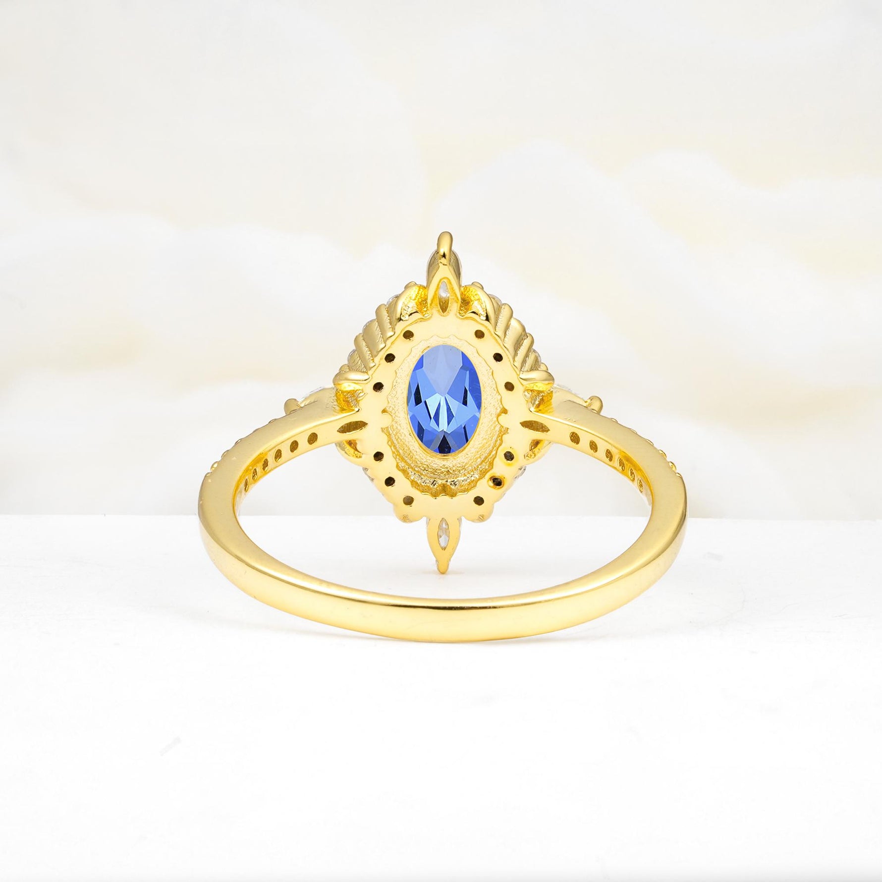 Oval Cut Sapphire Starburst Halo Engagement Ring with Pavé Band - Additional view