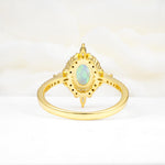 Oval Cut Fire Opal Starburst Halo Engagement Ring with Pavé Band - Additional view