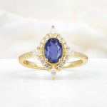 Oval Cut Tanzanite Starburst Halo Engagement Ring with Pavé Band - Additional view