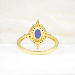 Oval Cut Tanzanite Starburst Halo Engagement Ring with Pavé Band - Additional view