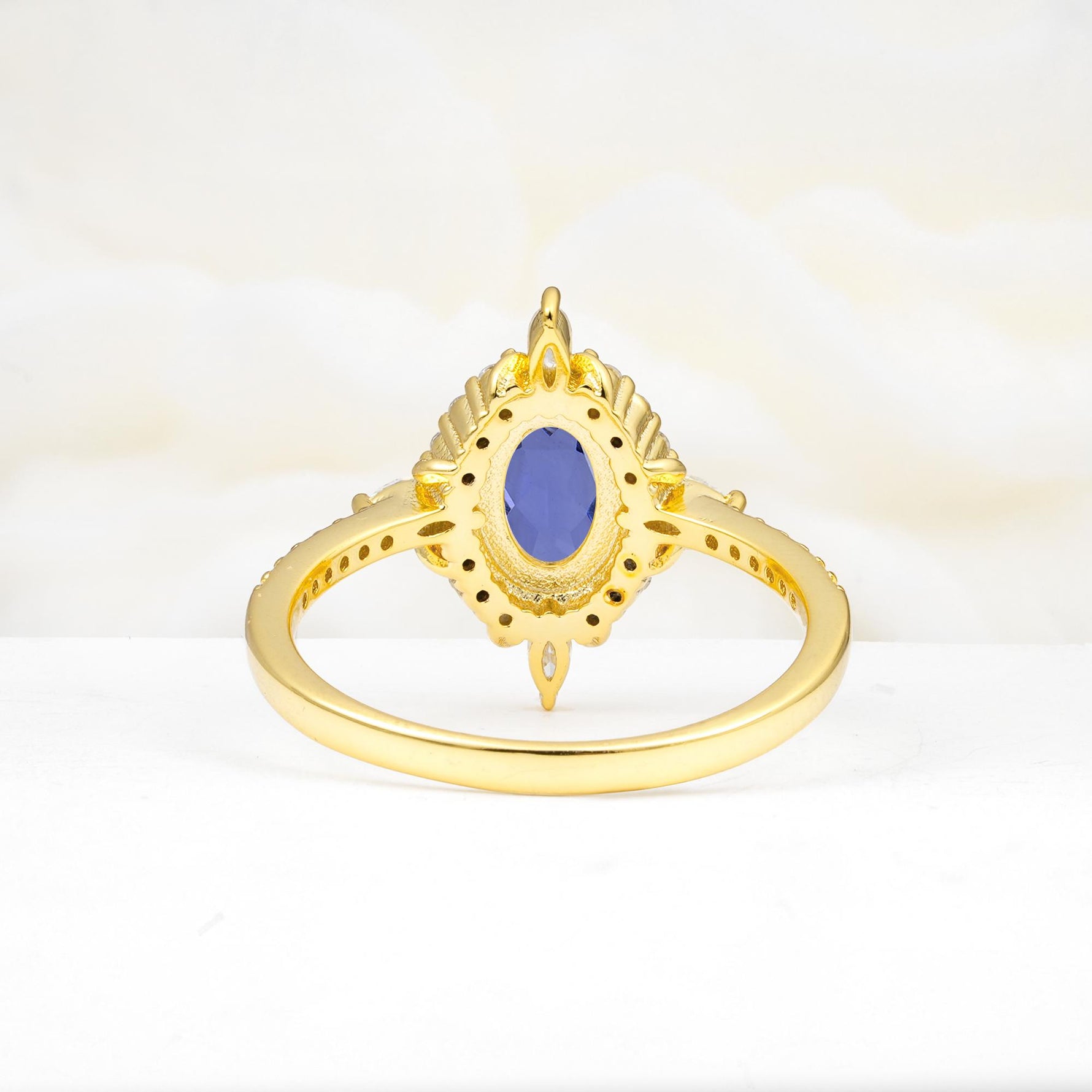 Oval Cut Tanzanite Starburst Halo Engagement Ring with Pavé Band - Additional view