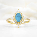 Oval Cut Turquoise Starburst Halo Engagement Ring with Pavé Band - Additional view