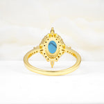 Oval Cut Turquoise Starburst Halo Engagement Ring with Pavé Band - Additional view