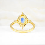 Oval Cut Moonstone Starburst Halo Engagement Ring with Pavé Band - Additional view