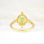 Oval Cut Peridot Starburst Halo Engagement Ring with Pavé Band - Additional view