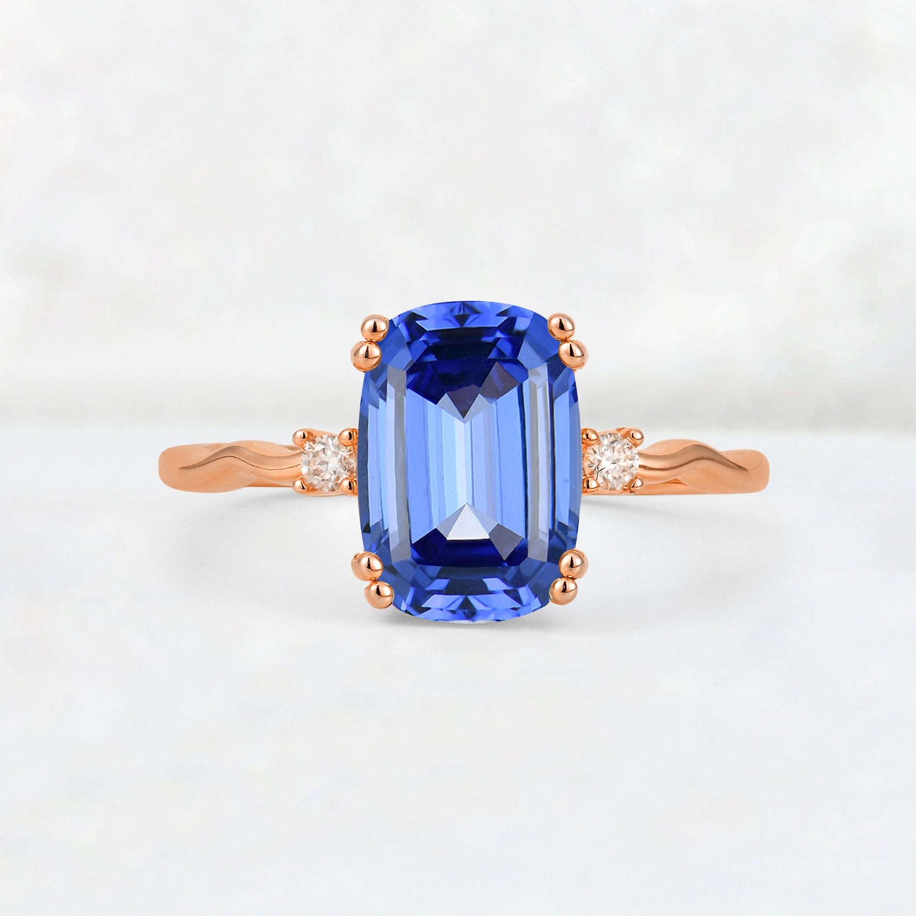 Emerald Cut Sapphire Twisted Three-Stone Engagement Ring - Additional view