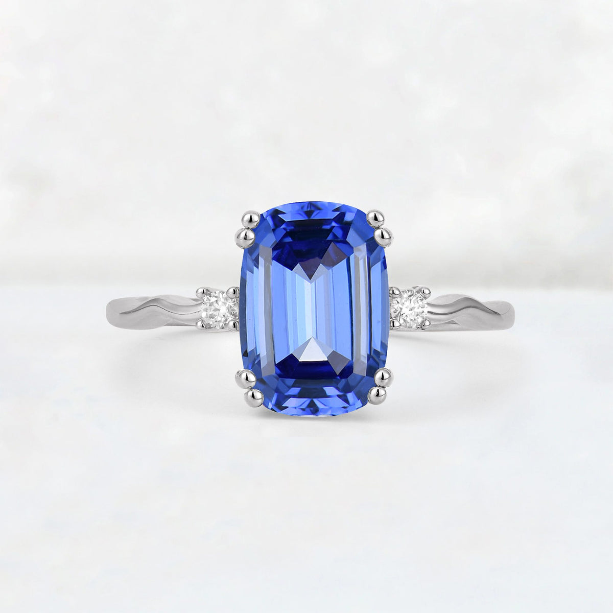 Emerald Cut Sapphire Twisted Three-Stone Engagement Ring - Additional view