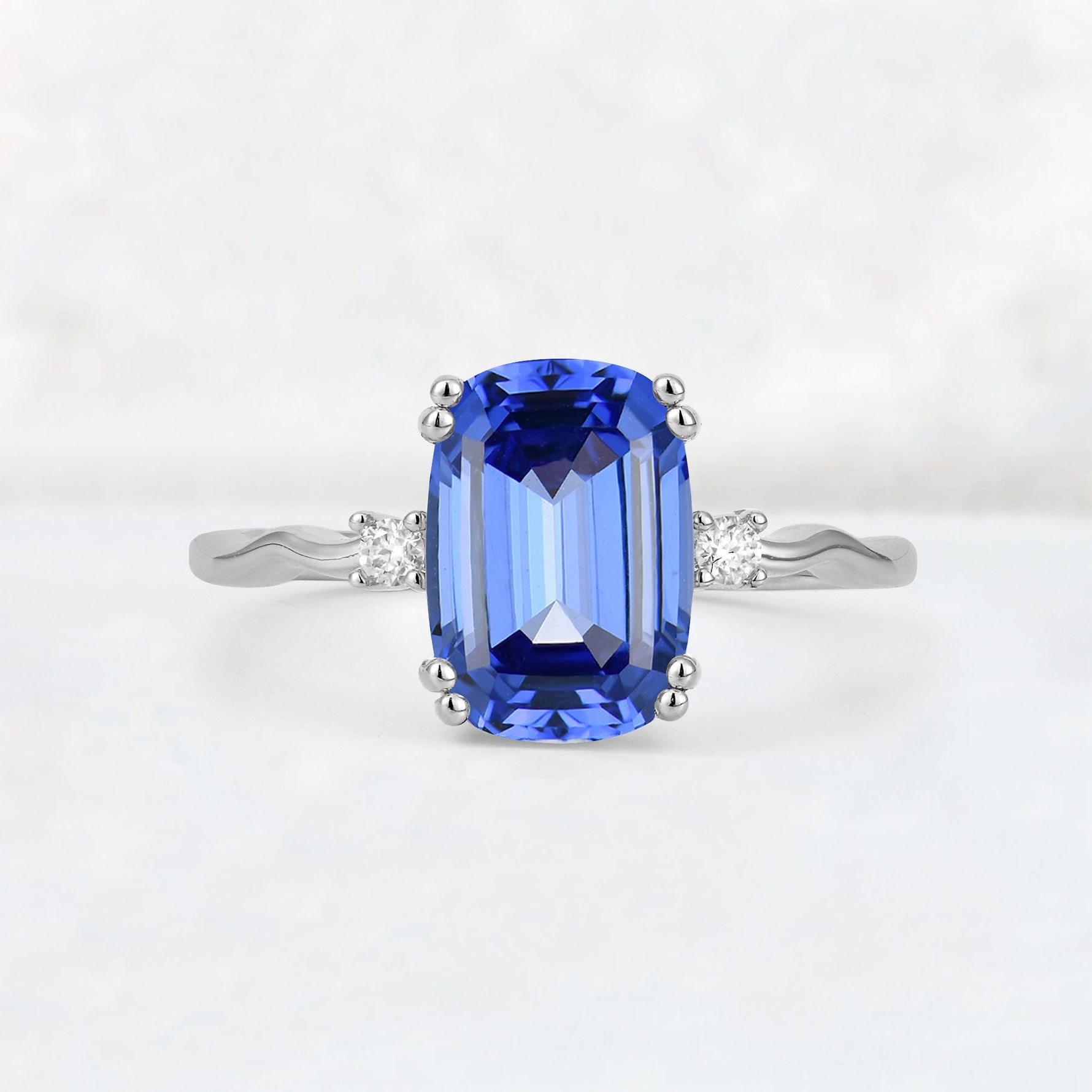 Emerald Cut Sapphire Twisted Three-Stone Engagement Ring - Additional view