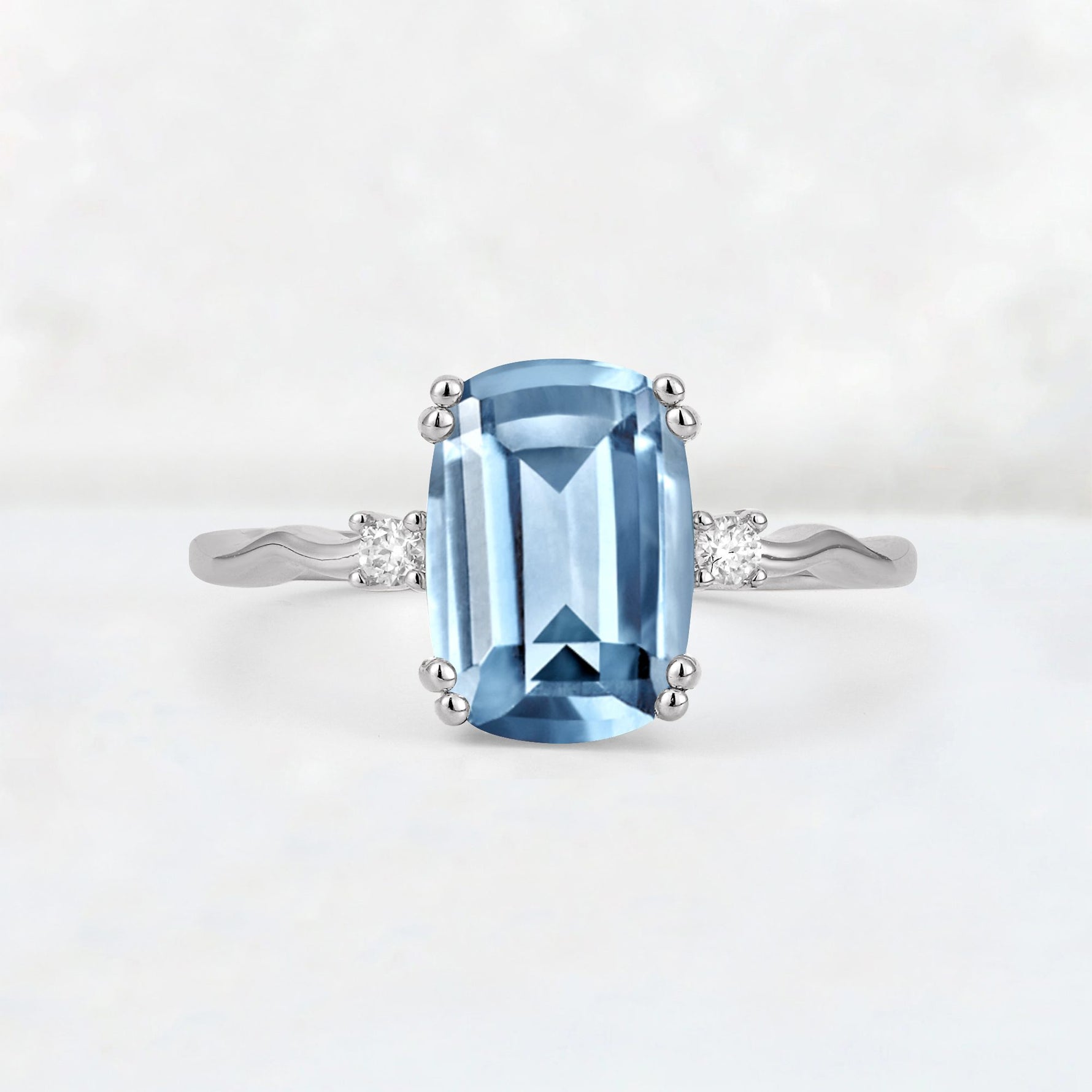 Emerald Cut Aquamarine Twisted Three-Stone Engagement Ring - Additional view