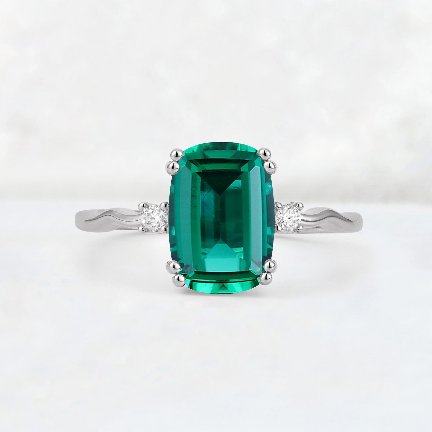 Emerald Cut Emerald Twisted Three-Stone Engagement Ring - Additional view