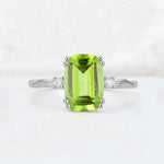 Emerald Cut Peridot Twisted Three-Stone Engagement Ring - Additional view