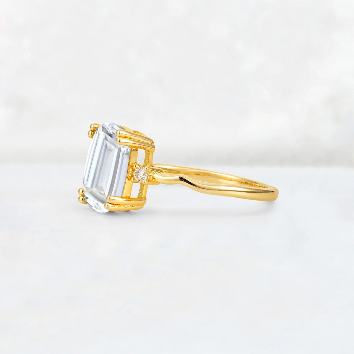 Emerald Cut Moissanite Twisted Three-Stone Engagement Ring - Additional view