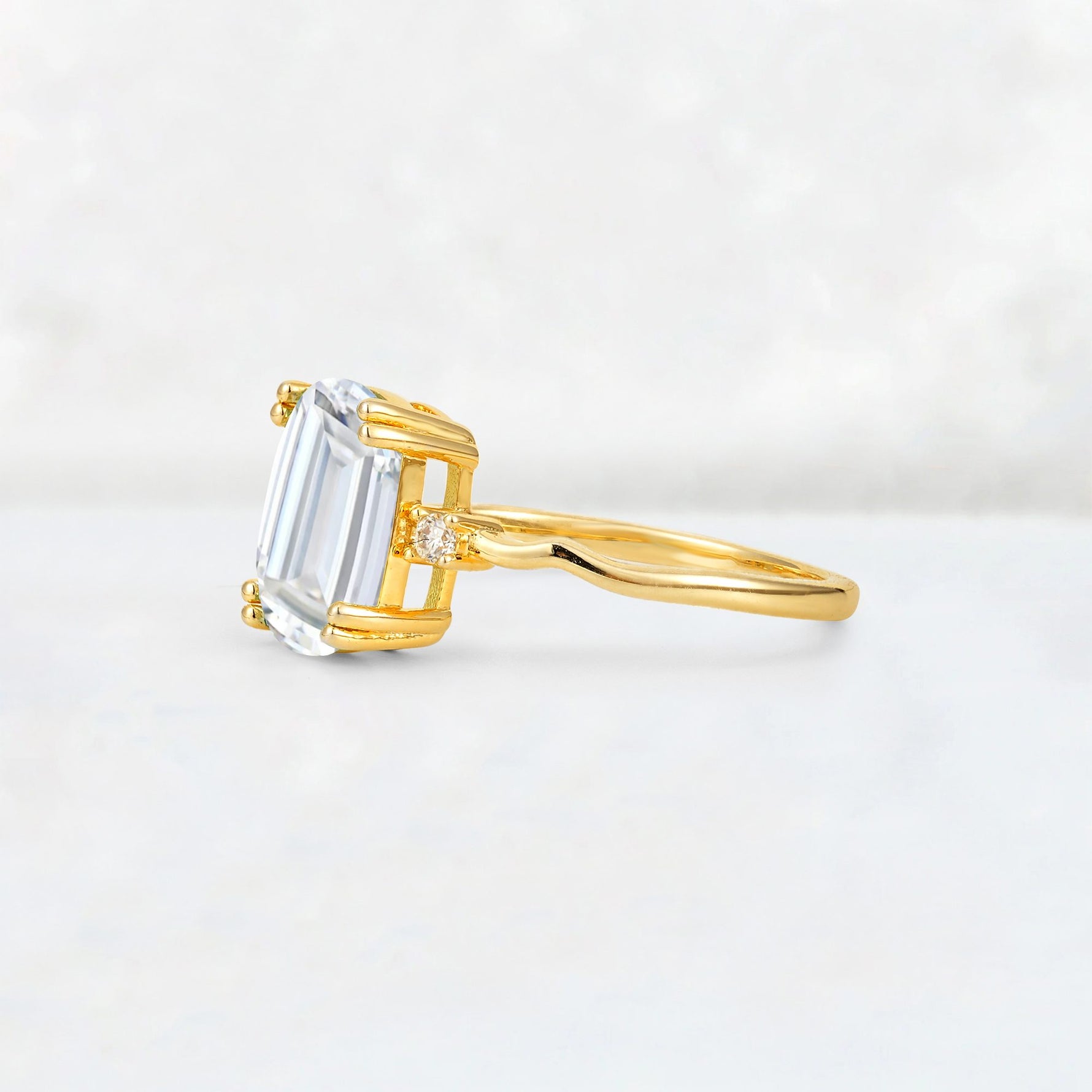 Emerald Cut Moissanite Twisted Three-Stone Engagement Ring - Additional view