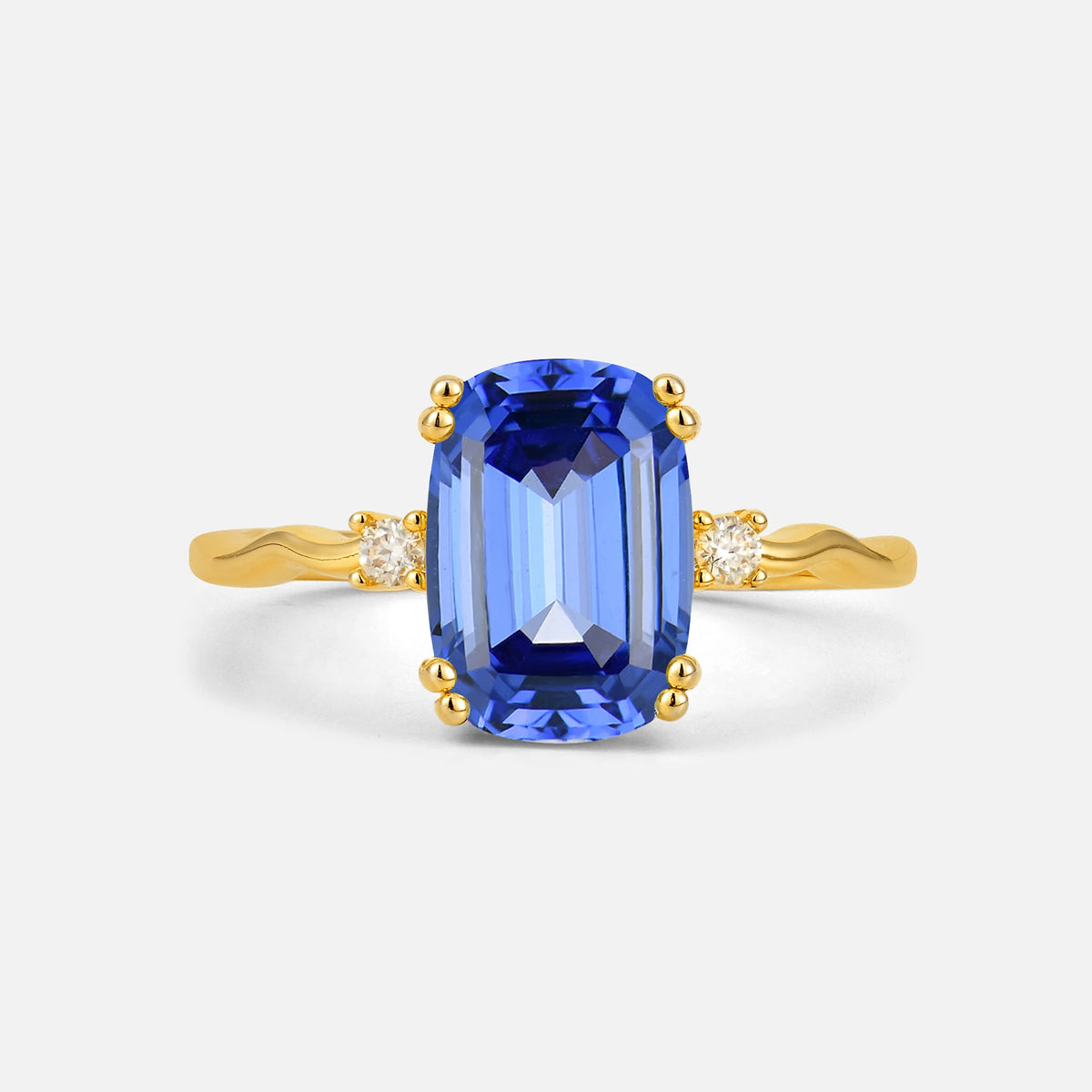 Emerald Cut Sapphire Twisted Three-Stone Engagement Ring