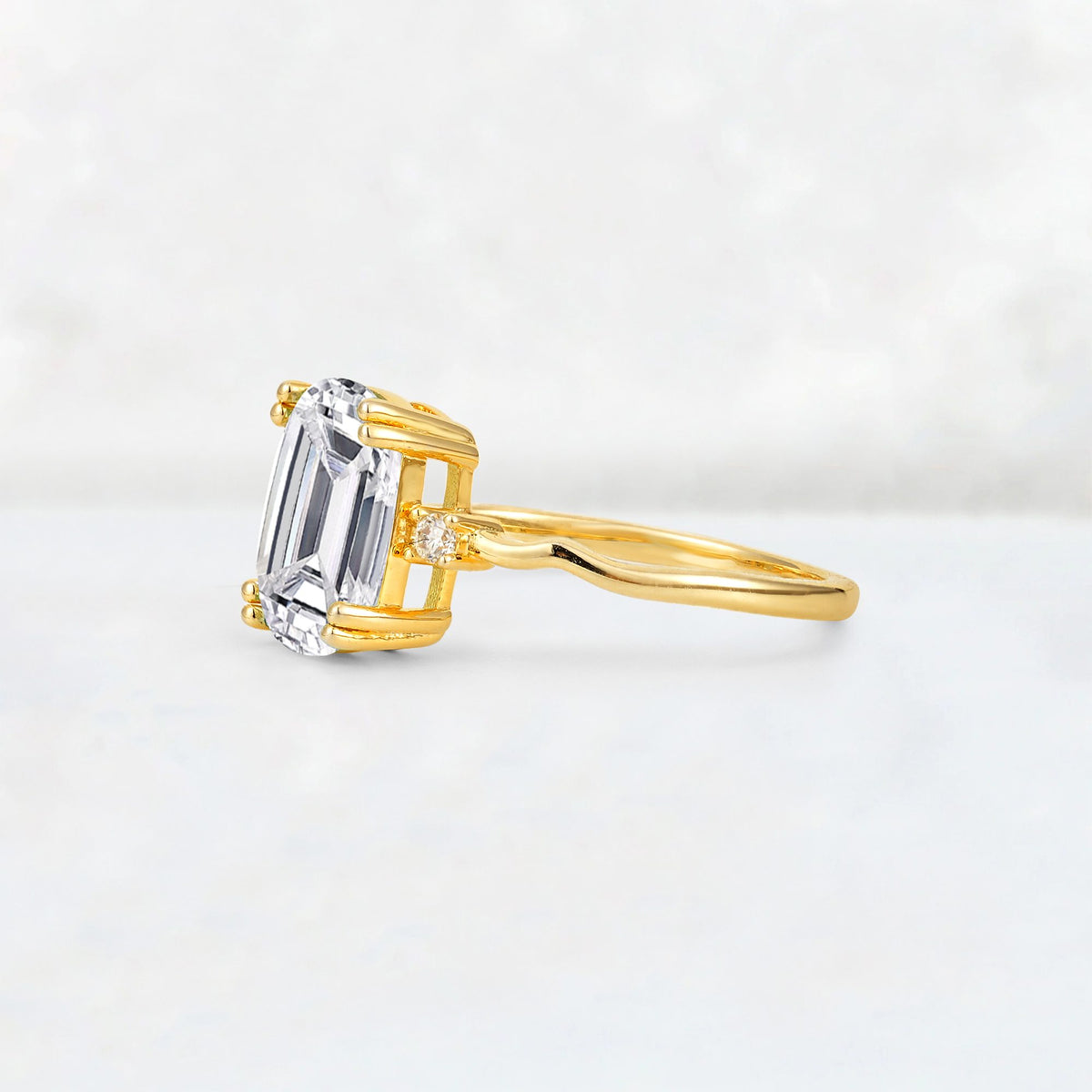 Emerald Cut Lab Diamond Twisted Three-Stone Engagement Ring - Additional view