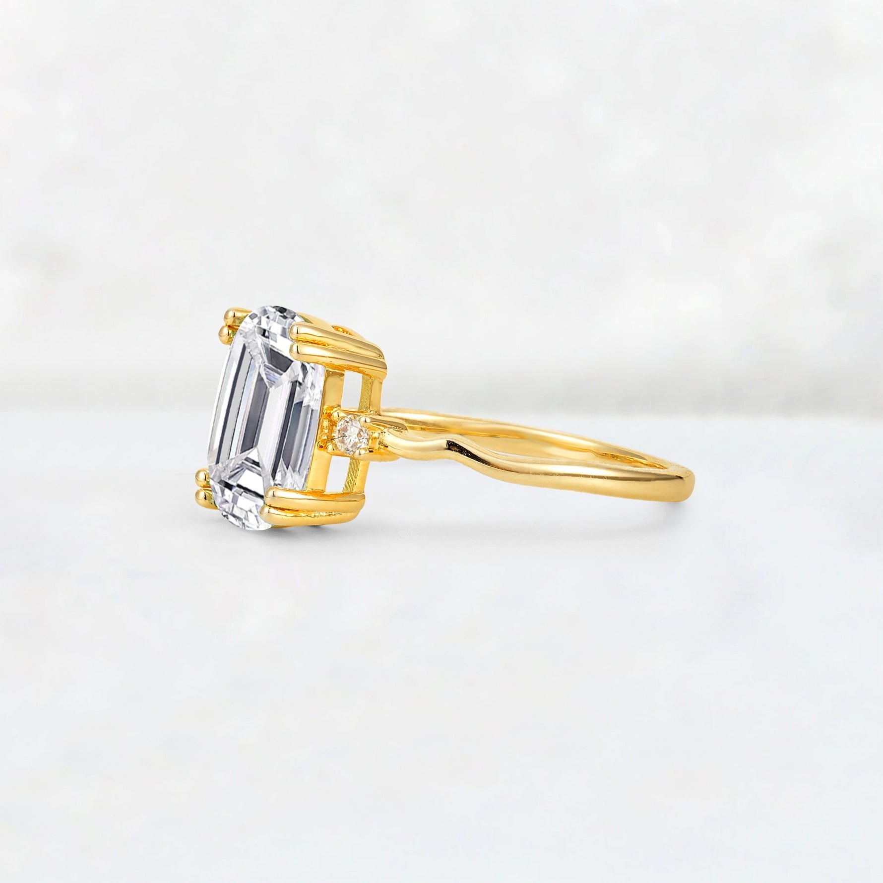 Emerald Cut Lab Diamond Twisted Three-Stone Engagement Ring - Additional view