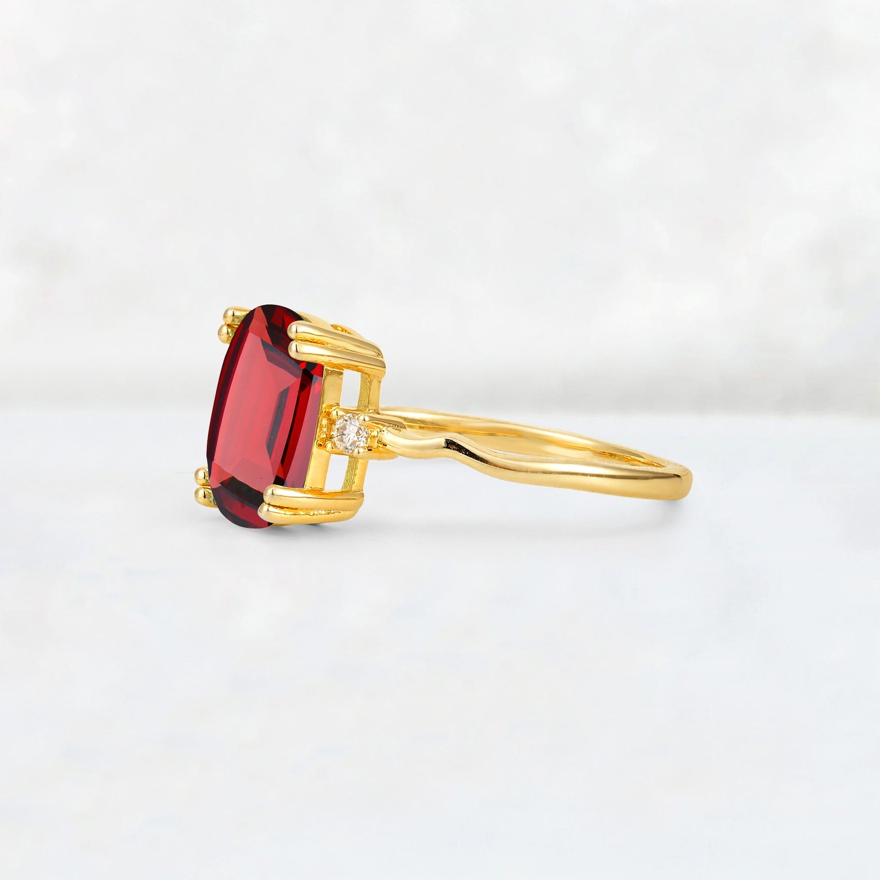 Emerald Cut Garnet Twisted Three-Stone Engagement Ring - Additional view