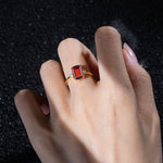Emerald Cut Garnet Twisted Three-Stone Engagement Ring - Additional view
