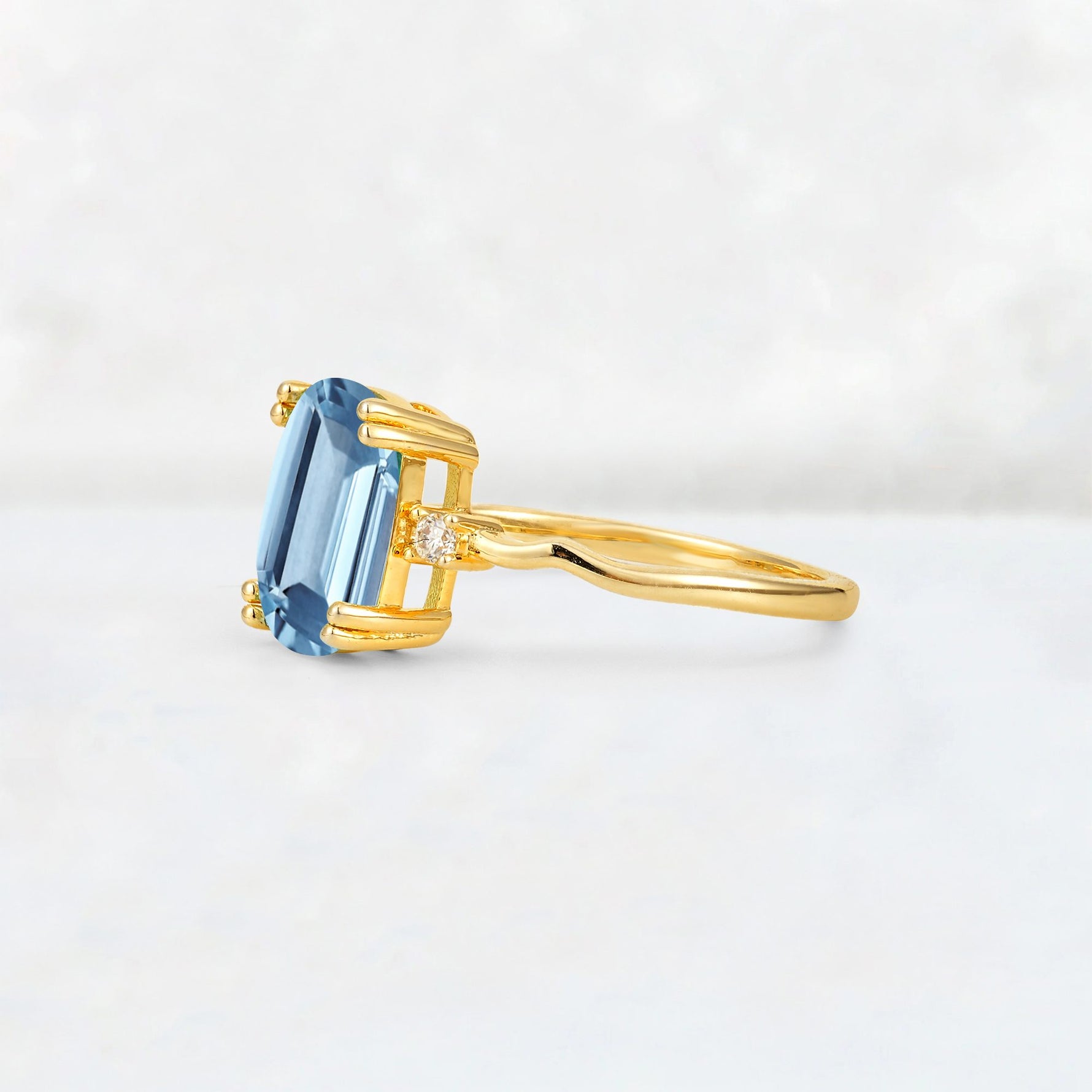Emerald Cut Aquamarine Twisted Three-Stone Engagement Ring - Additional view