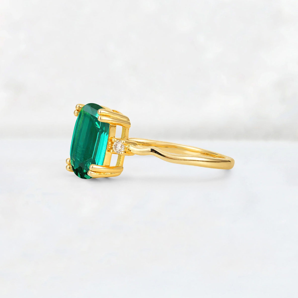 Emerald Cut Emerald Twisted Three-Stone Engagement Ring - Additional view