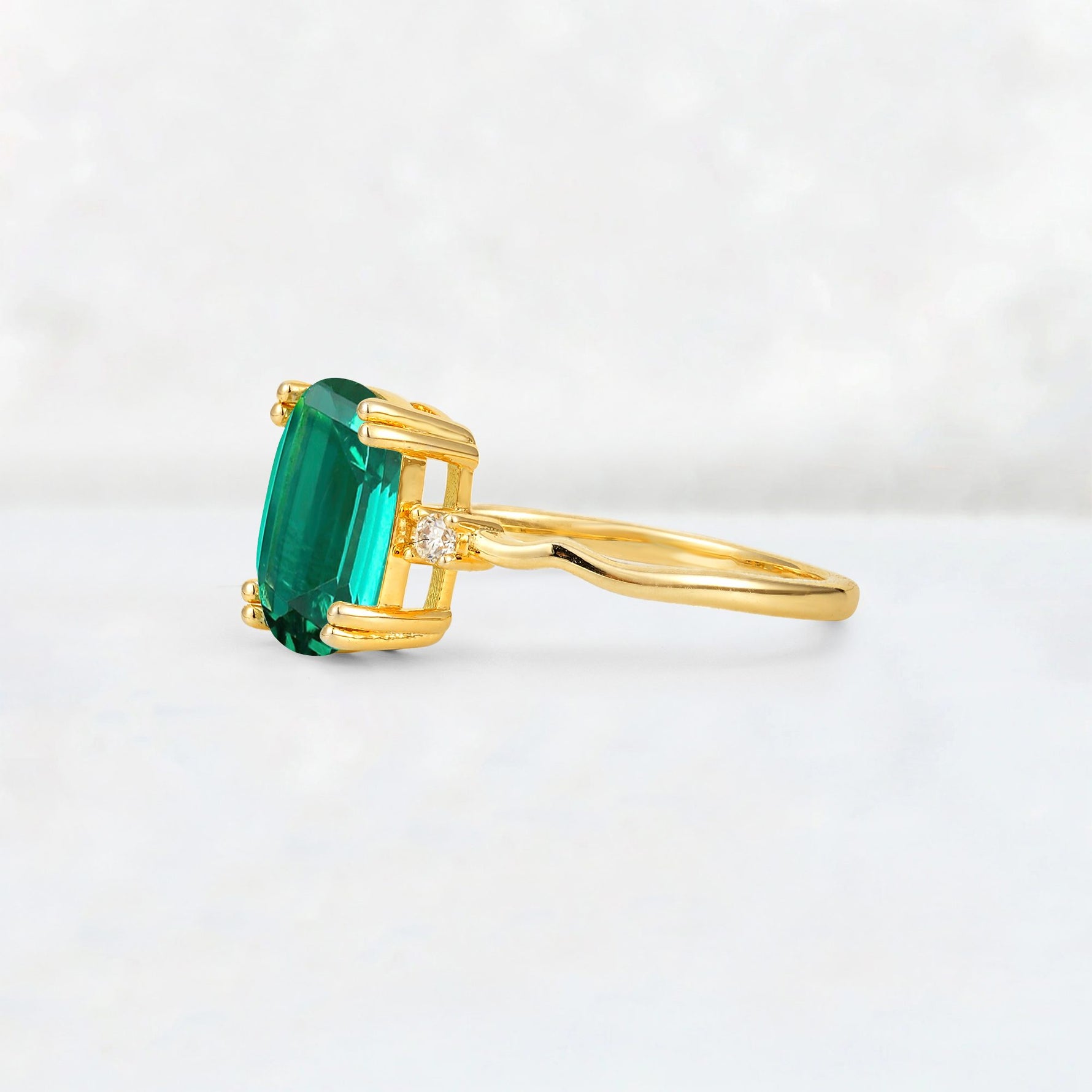 Emerald Cut Emerald Twisted Three-Stone Engagement Ring - Additional view