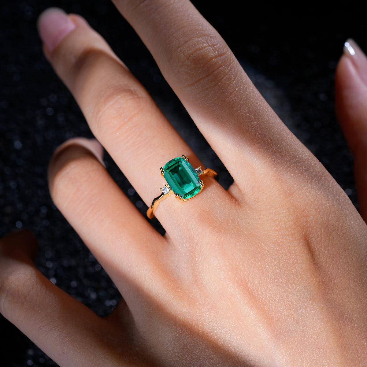 Emerald Cut Emerald Twisted Three-Stone Engagement Ring