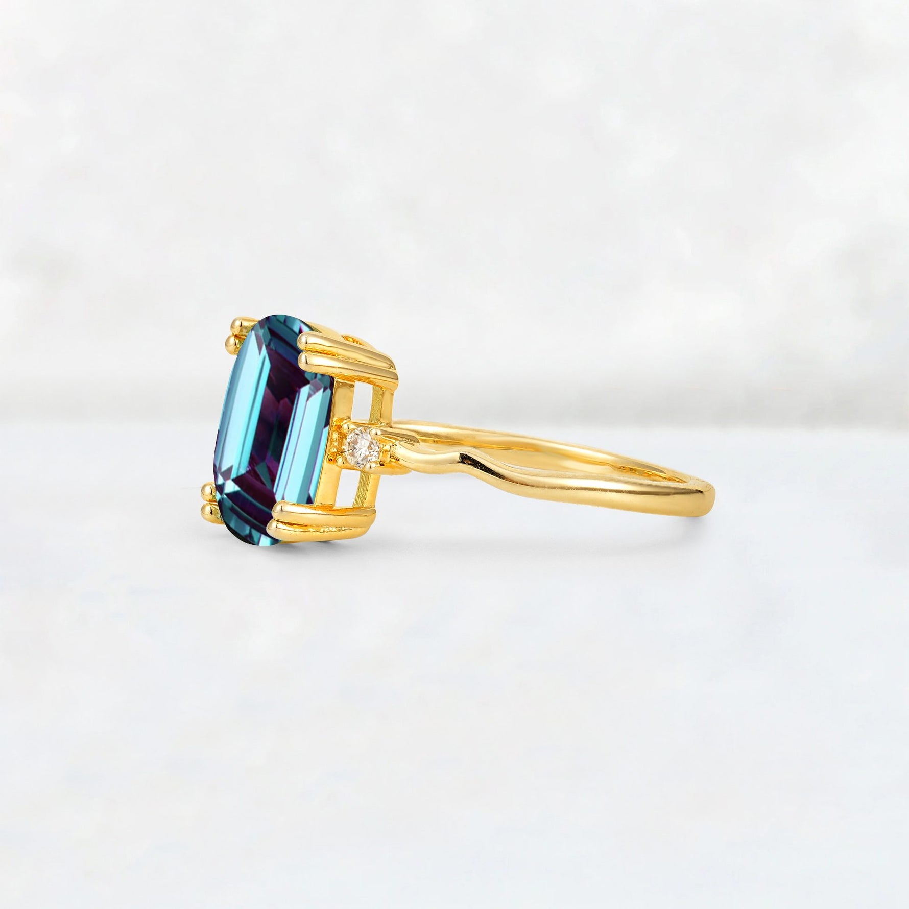 Emerald Cut Alexandrite Twisted Three-Stone Engagement Ring - Additional view