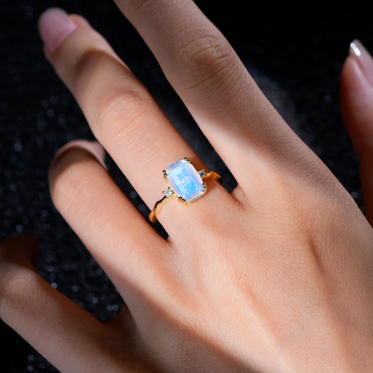 Emerald Cut Moonstone Twisted Three-Stone Engagement Ring