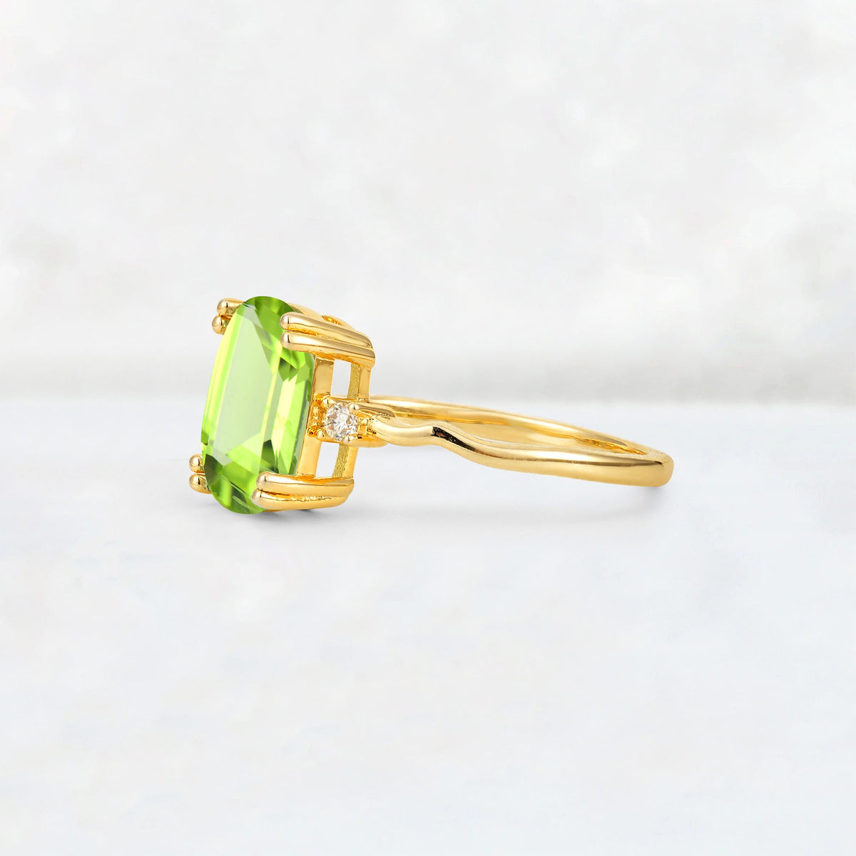 Emerald Cut Peridot Twisted Three-Stone Engagement Ring - Additional view