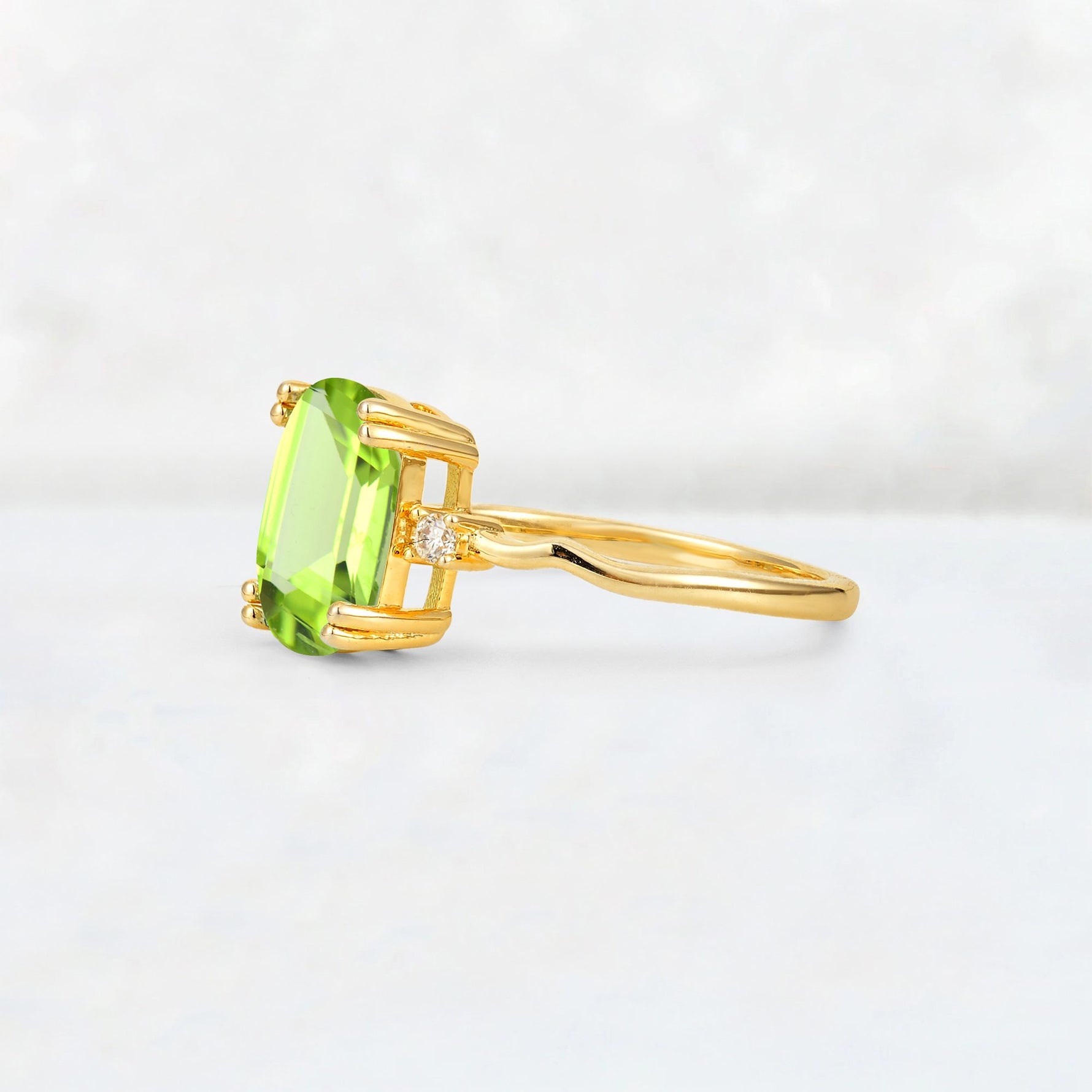 Emerald Cut Peridot Twisted Three-Stone Engagement Ring - Additional view