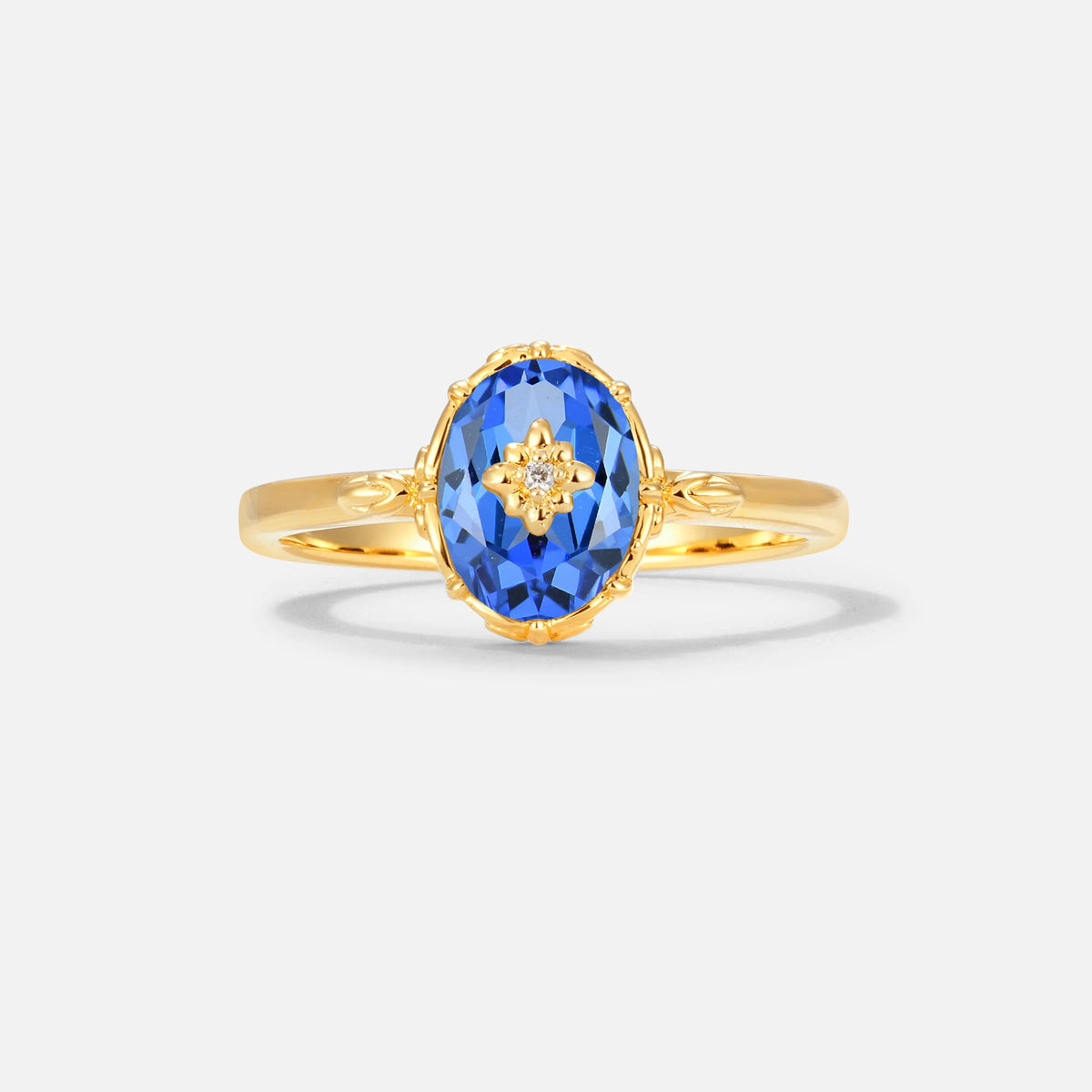 Vintage Floral Oval Sapphire Engagement Ring
