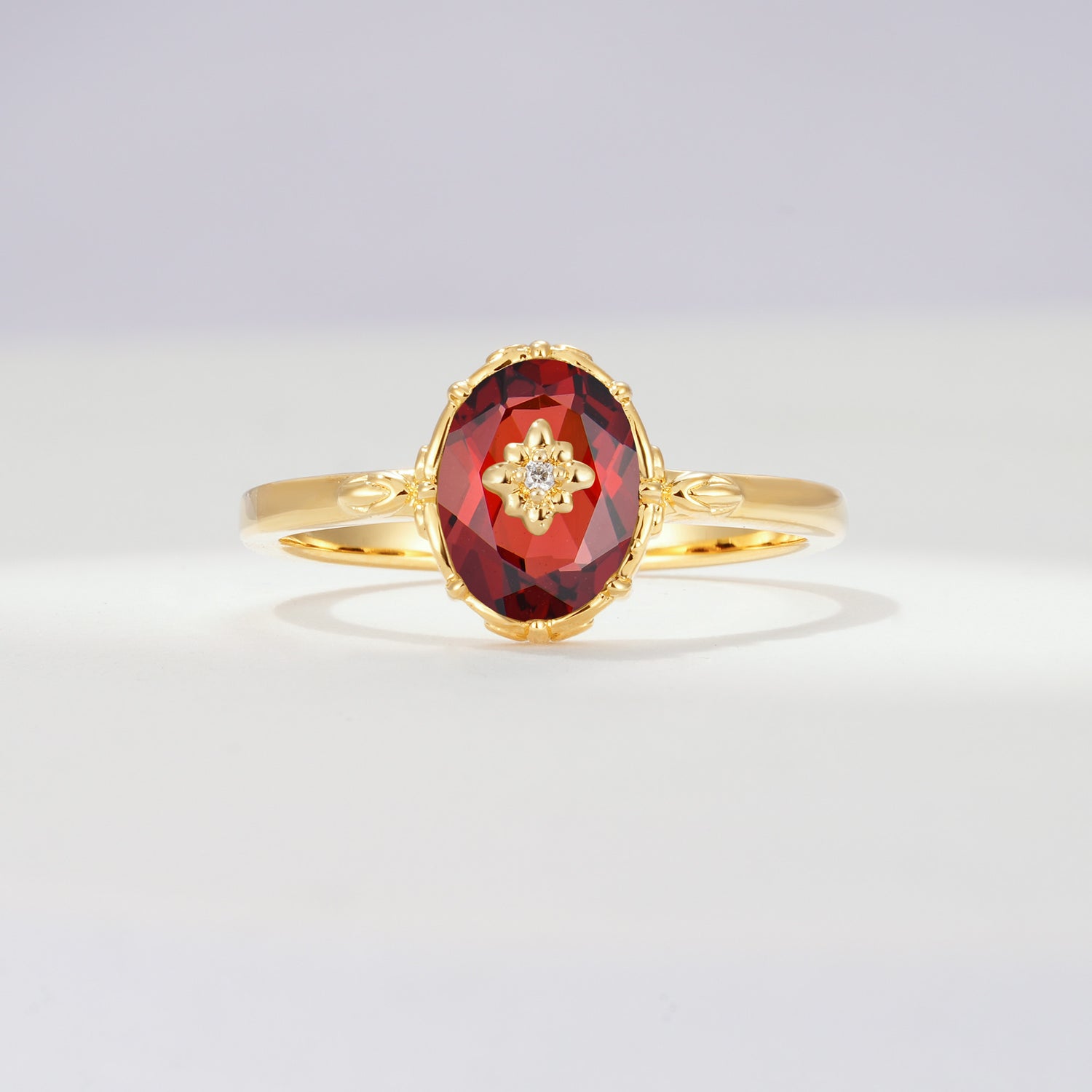 Vintage Floral Oval Garnet Engagement Ring