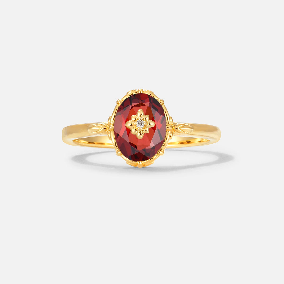 Vintage Floral Oval Garnet Engagement Ring