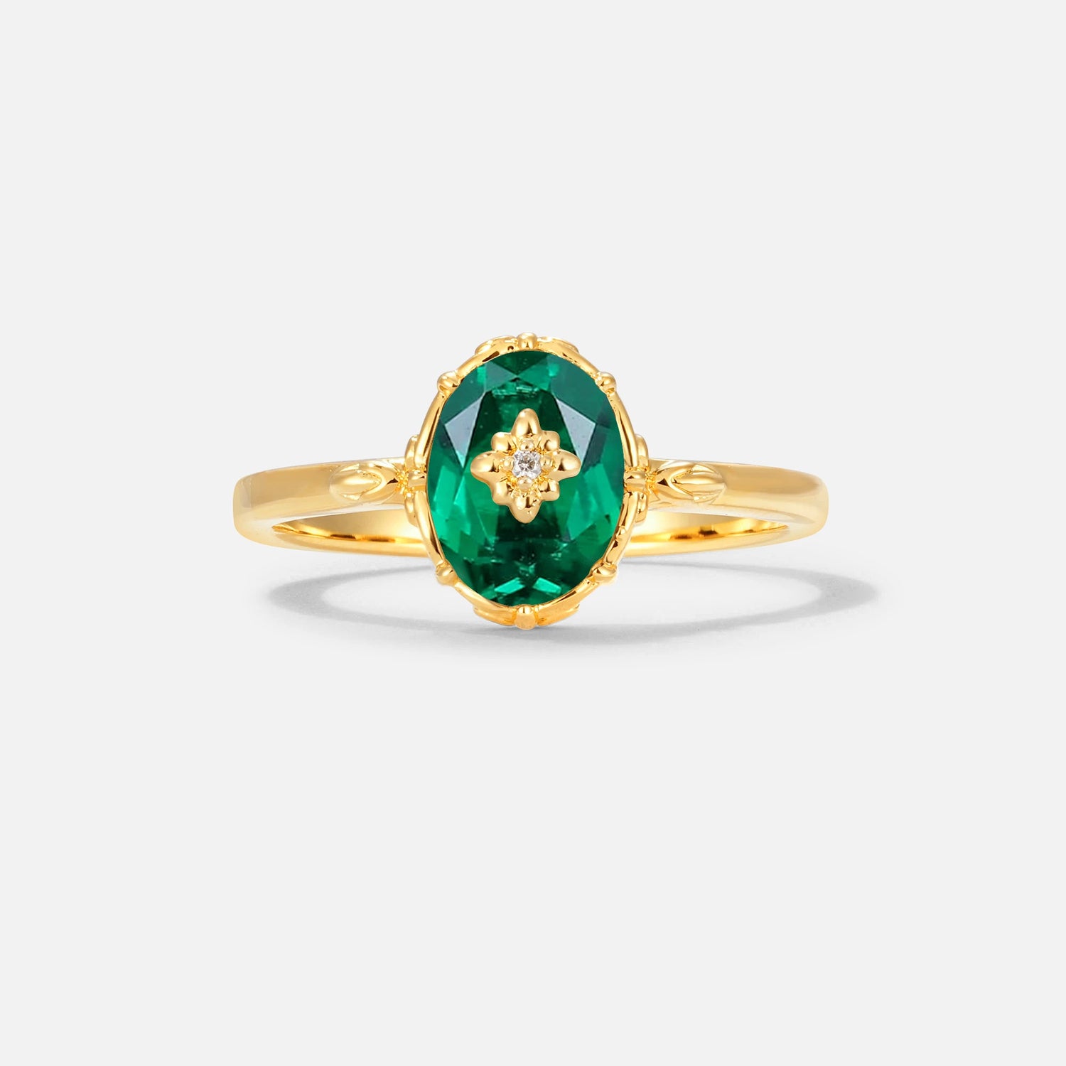 Vintage Floral Oval Emerald Engagement Ring