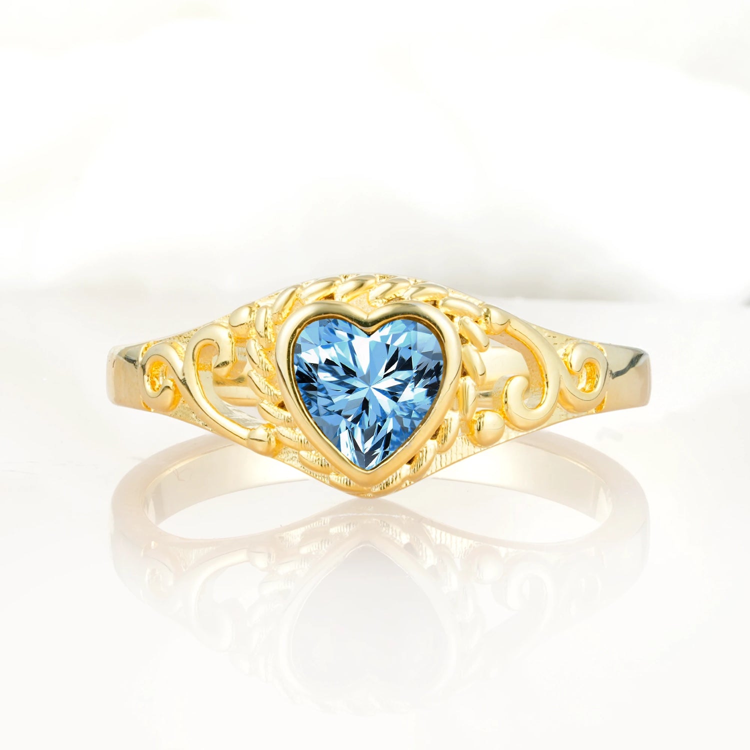 Heart-Shaped Aquamarine Engagement Ring with Intricate Band