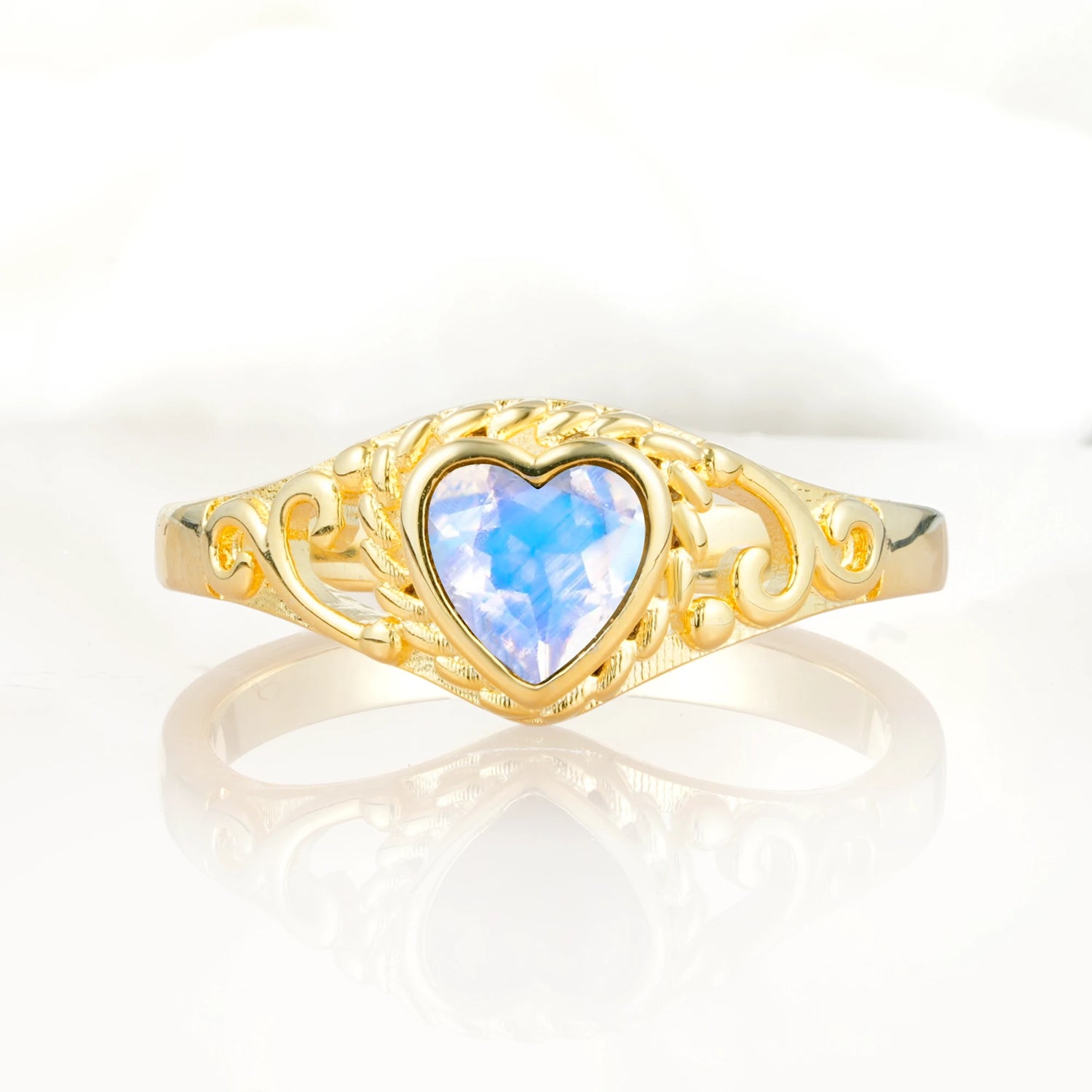 Heart-Shaped Moonstone Engagement Ring with Intricate Band