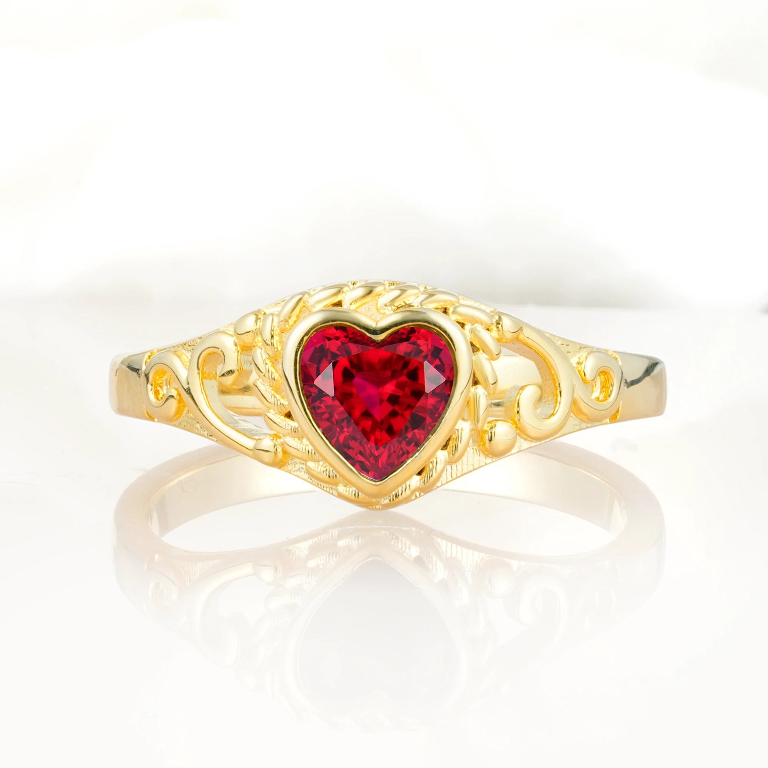Heart-Shaped Ruby Engagement Ring with Intricate Band