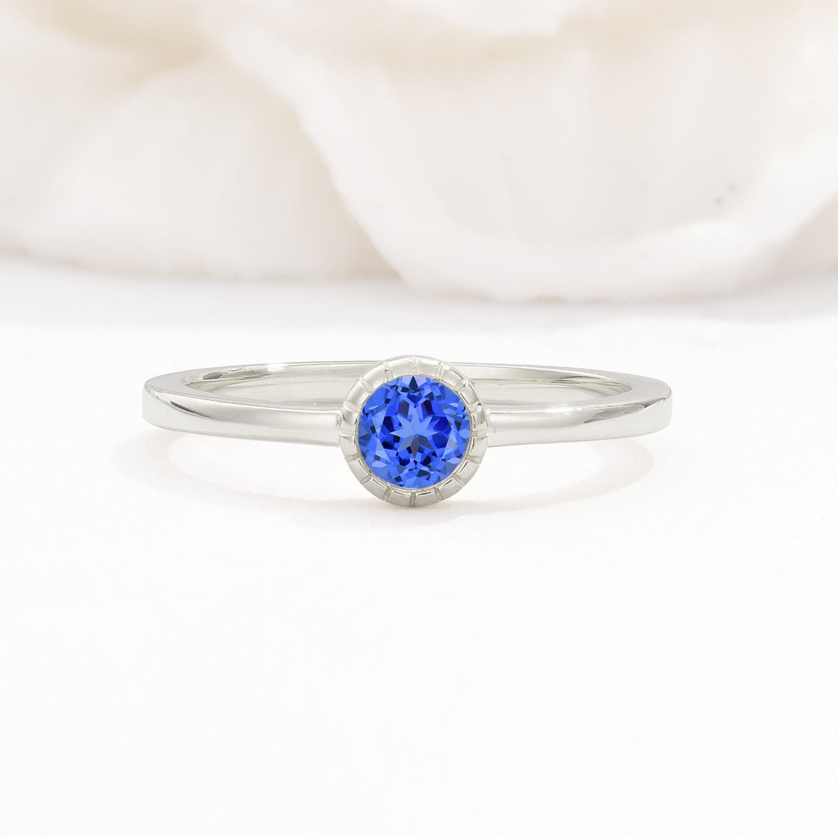 Minimalist Round Cut Bezel Set Solitaire Sapphire Engagement Ring - Additional view