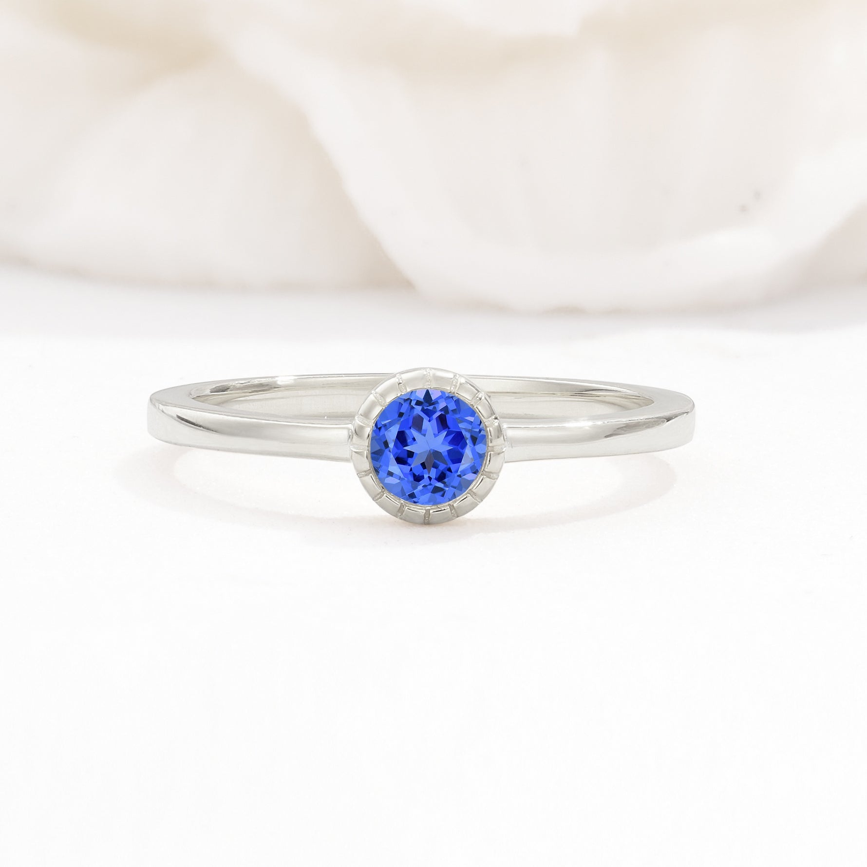 Minimalist Round Cut Bezel Set Solitaire Sapphire Engagement Ring - Additional view