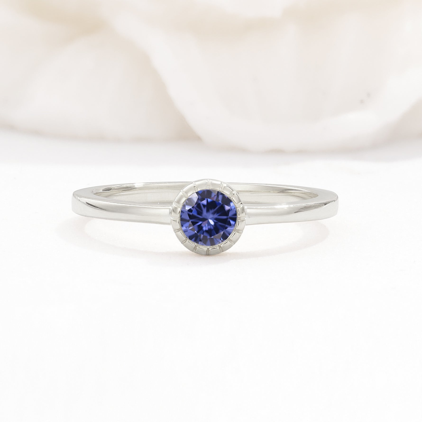 Minimalist Round Cut Bezel Set Solitaire Tanzanite Engagement Ring - Additional view