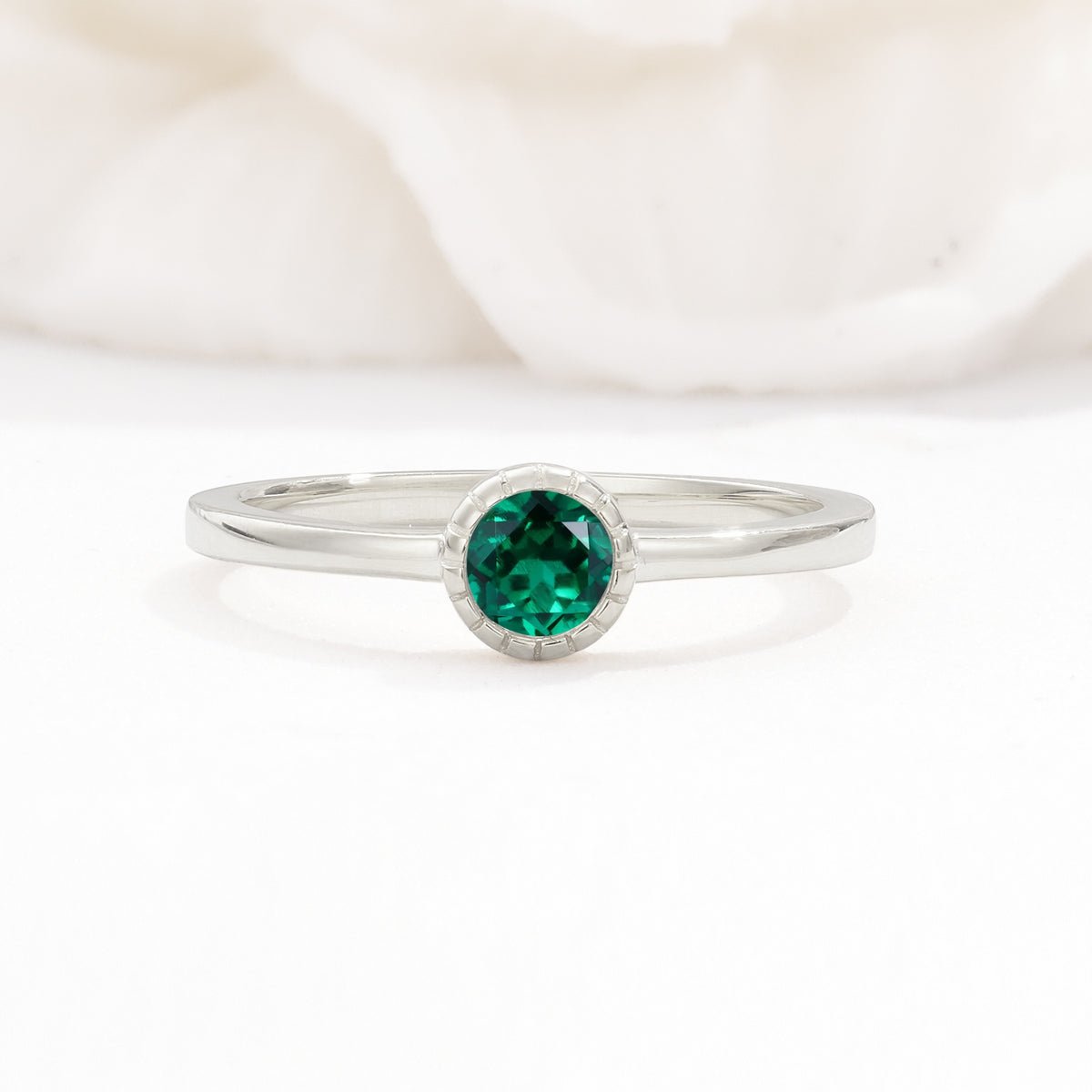 Minimalist Round Cut Bezel Set Solitaire Emerald Engagement Ring - Additional view